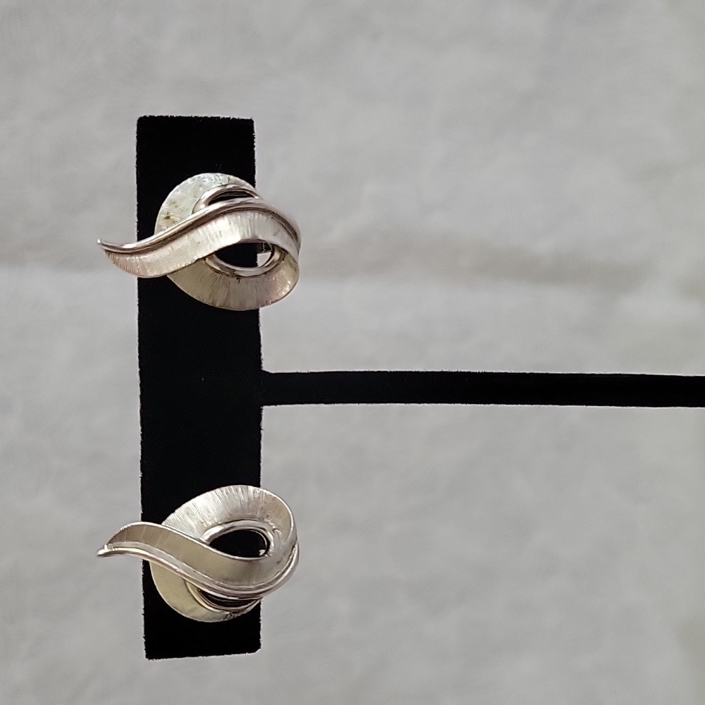 Trifari Silver Swirl Clip Earrings